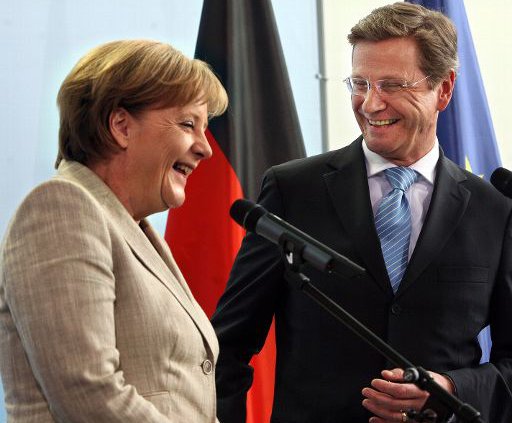 Angela Merkel (CDU) und Guido Westerwelle (FDP) mit bitteren Neuigkeiten