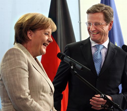 Angela Merkel (CDU) und Guido Westerwelle (FDP) mit bitteren Neuigkeiten