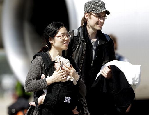 Belgisch-japanische Familie beim Zwischenstopp in Madrid