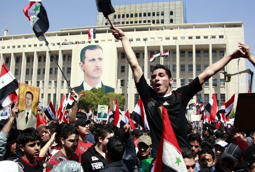 Unterstützer von Präsident Bashar Al-Assad demonstrieren in Damaskus