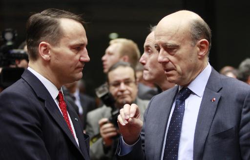 Frankreichs Außenminister Alain Juppé und Poolens Außenminister Radoslaw Sikorski in Brüssel