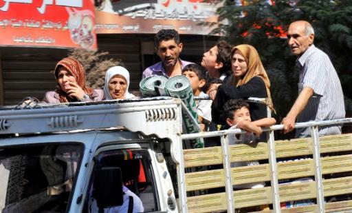 Viele Menschen fliehen aus der syrischen Metropole Aleppo