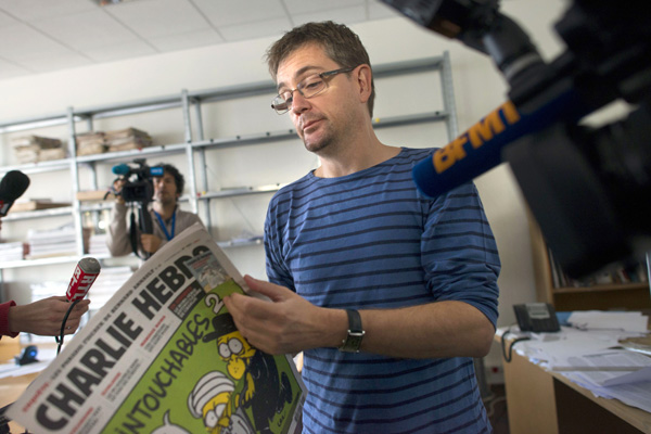 Charlie Hebo-Herausgeber "Charb" im Gespräch mit Journalisten