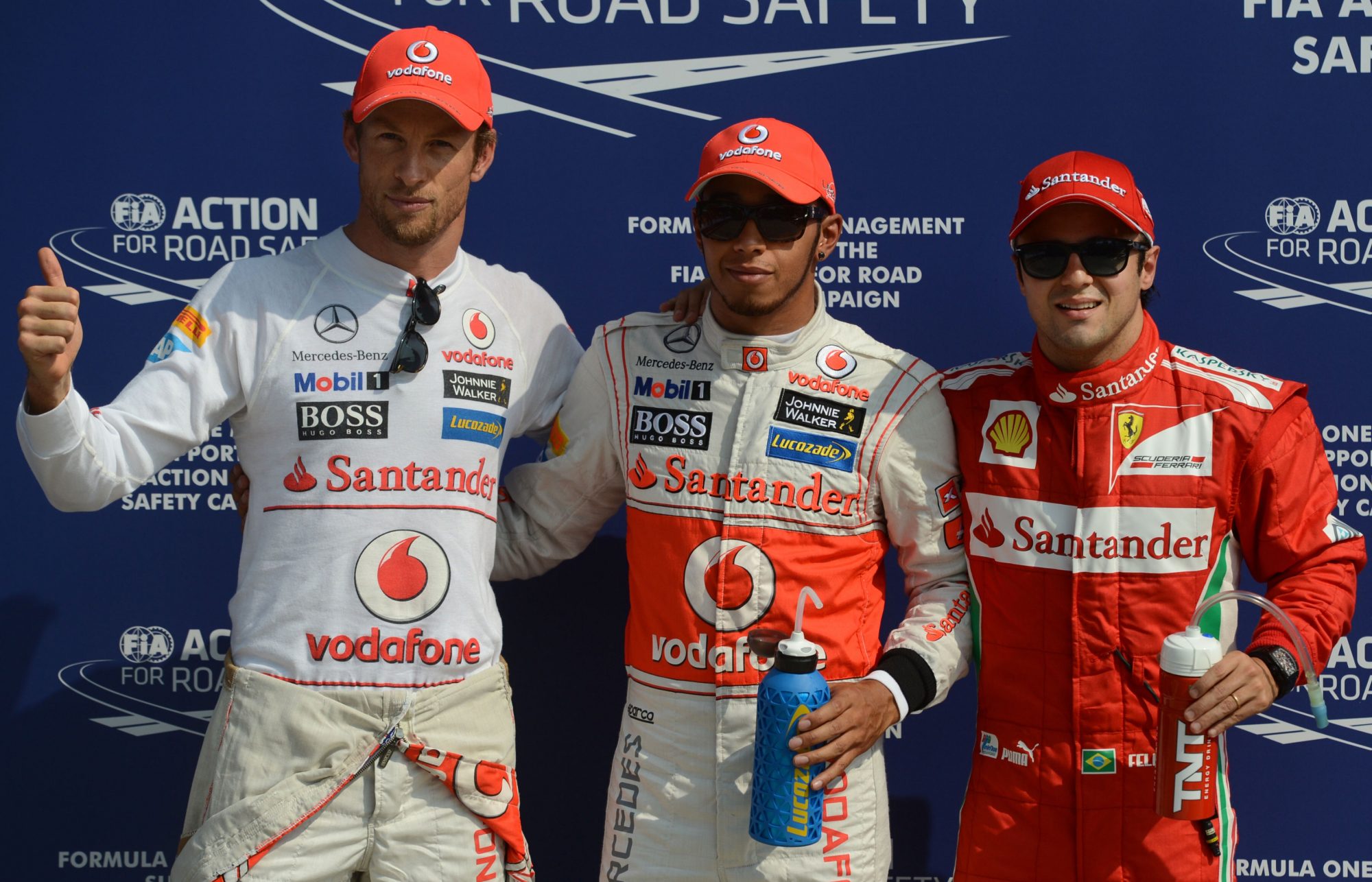 Jenson Button, Lewis Hamilton und Felipe Massara in Monza