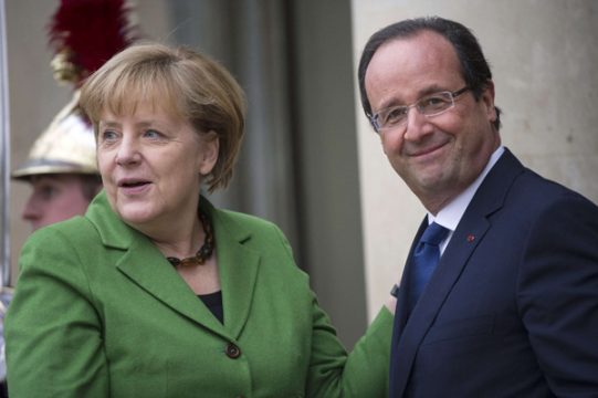 Angela Merkel und François Hollande vor den Beratungen in Paris