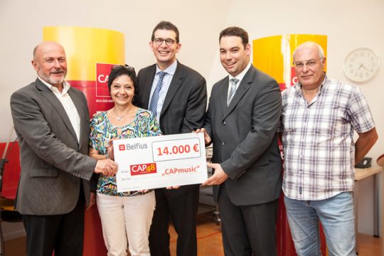 Scheckübergabe des Erlöses vom CAPmusic-Tag