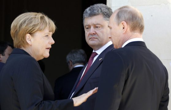 Staatschefs unter sich: Angela Merkel, Petro Poroschenko und Wladimir Putin