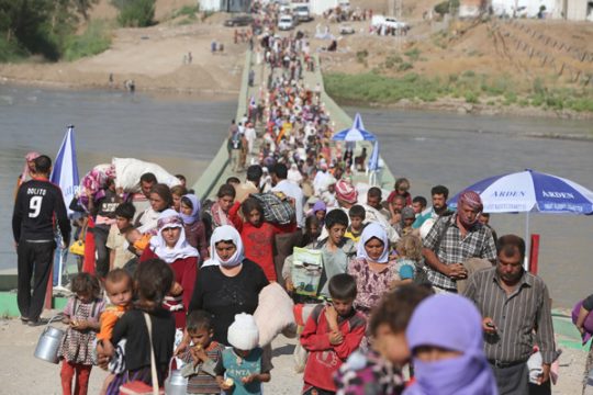 Jesiden auf dem Weg über die Fishkhabur-Brücke nach Syrien