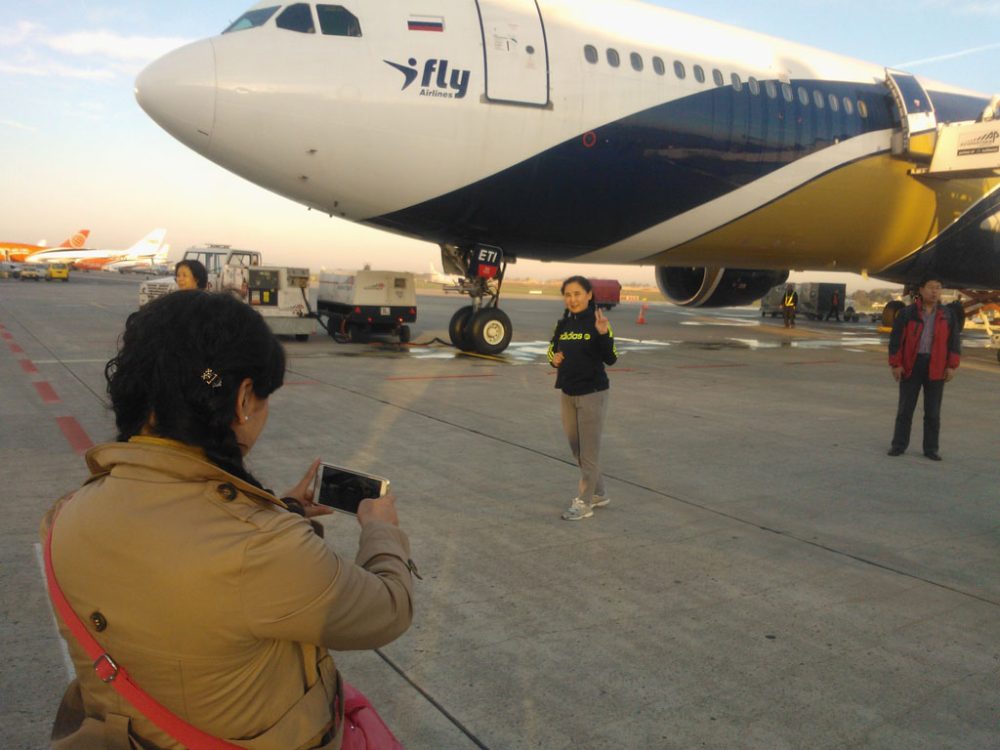 Chinesen am Flughafen Bierset