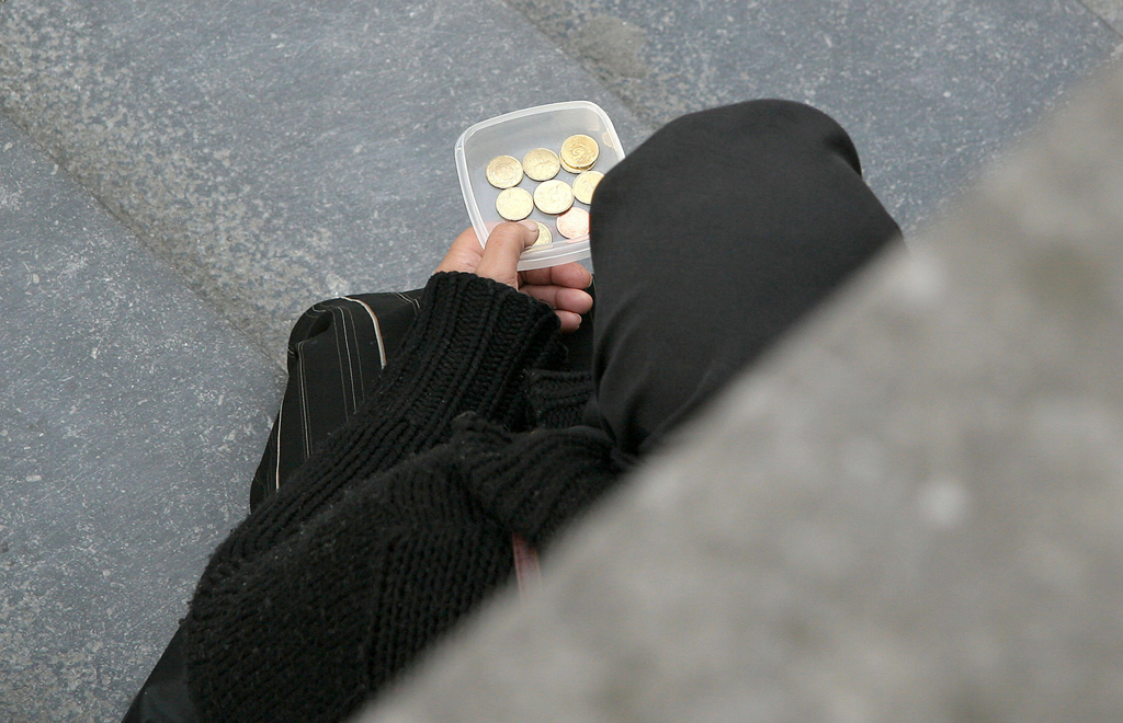 Eine Bettlerin in Brüssel