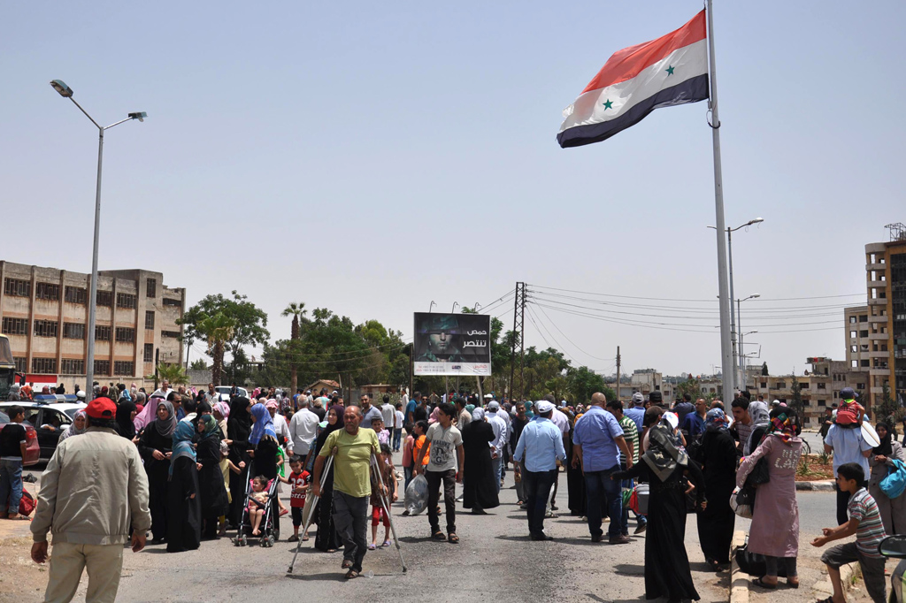 Syrer kehren wieder in ihre Heimatdörfer zurück, wie hier in der Nähe von Homs' al-Waer