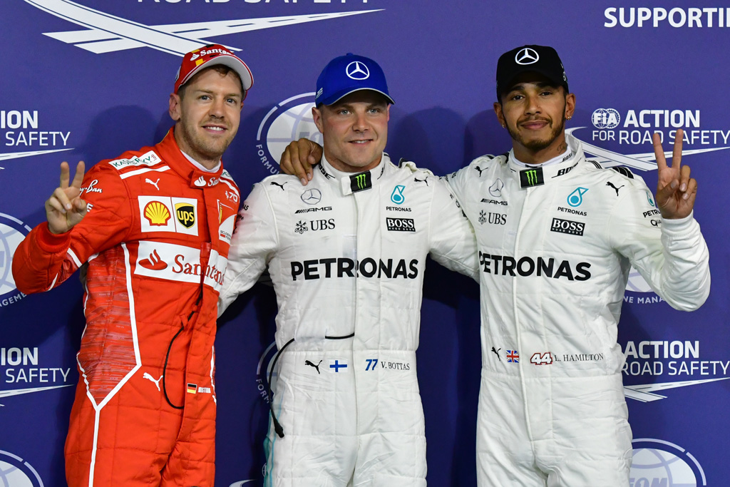Sebastian Vettel, Valtteri Bottas und Lewis Hamilton am 25.11.2017 in Abu Dhabi (Bild: Giuseppe Cacace/AFP)