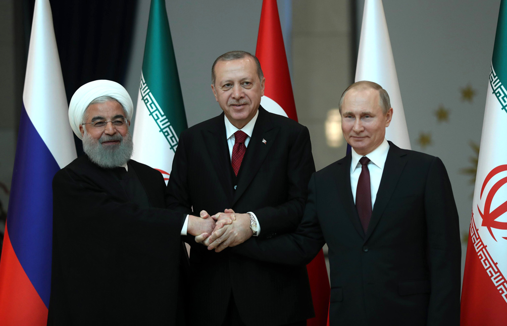 Hassan Ruhani, Recep Tayyip Erdogan und Wladimir Putin am Mittwoch in Ankara (Bild: Tolga Bozoglu/Pool/AFP)