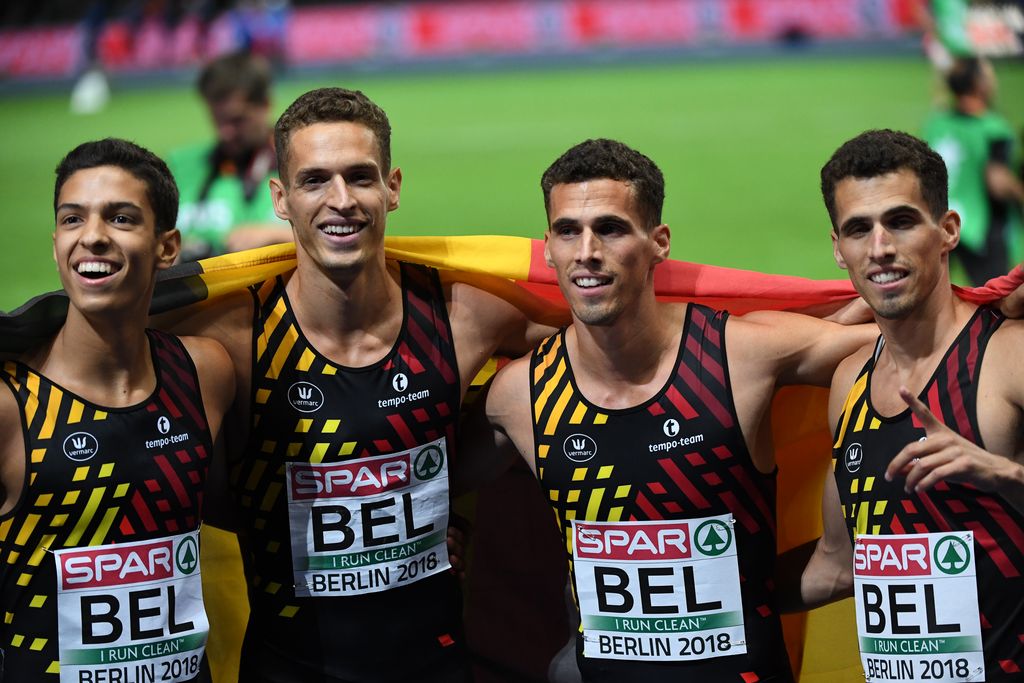 L-R, Belgian athlete Jonathan Sacoor, Belgian athlete Dylan Borlee, Belgian athlete Jonathan Borlee and Belgian athlete Kevin Borlee celebrate after winning the gold medal at the final of the men's relay 4 x 400m race at the European Athletics Championships, in Berlin, Germany, Saturday 11 August 2018. The European Athletics championships are held in Berlin from 07 to 12 August. BELGA PHOTO JASPER JACOBS