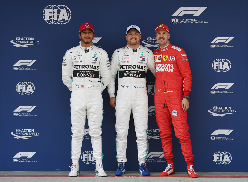Lewis Hamilton, Valtteri Bottas und Sebastian Vettel (Bild: Greg Baker/AFP)
