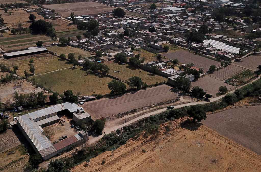 Luftaufnahme des Bauernhofs nahe der Ortschaft Tlajomulco (Bild: Ulises Ruiz/AFP)
