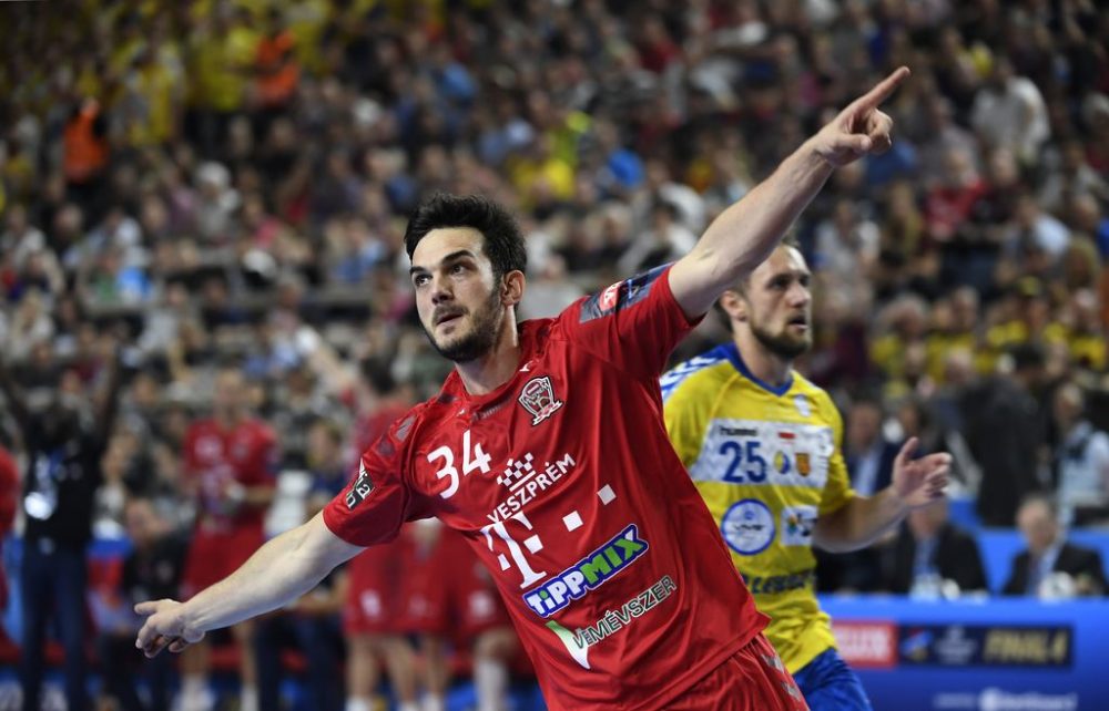 Veszprem's Petar Nenadic celebrates scoring during the Handball EHF Champions League semi-final Four final match between Telekom Veszprem and PGE Vive Kielce in Cologne, western Germany, on June 1, 2019. (Photo by INA FASSBENDER / AFP)