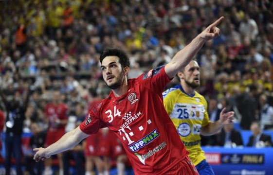 Veszprem's Petar Nenadic celebrates scoring during the Handball EHF Champions League semi-final Four final match between Telekom Veszprem and PGE Vive Kielce in Cologne, western Germany, on June 1, 2019. (Photo by INA FASSBENDER / AFP)