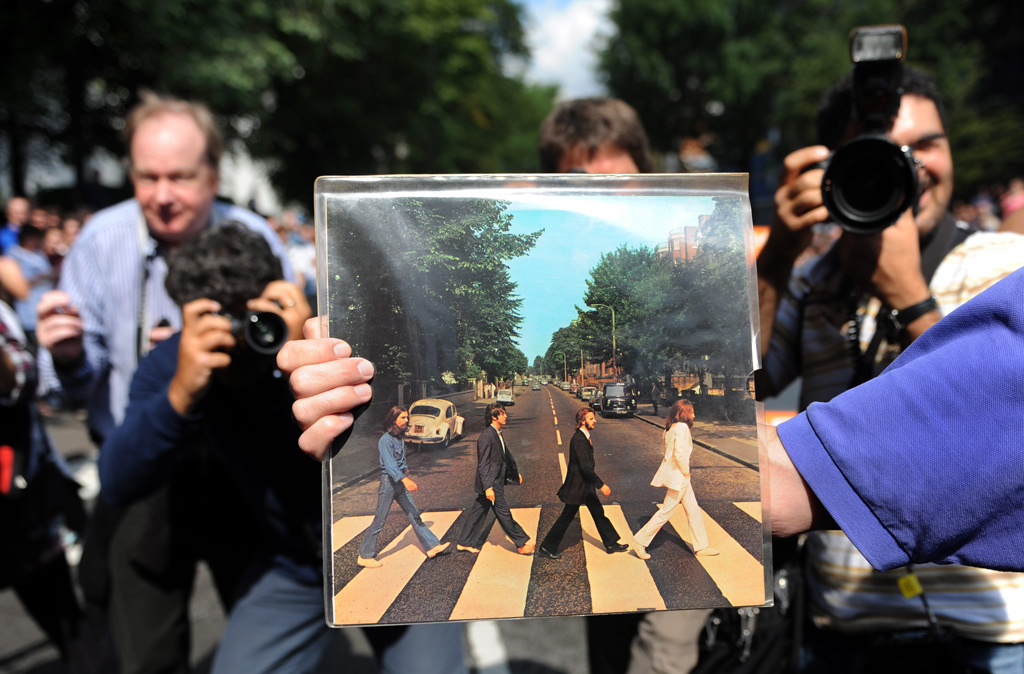 "Abbey Road“: Das wohl bekannteste Platten-Cover der Beatles (Bild: Andy Rain/EPA)