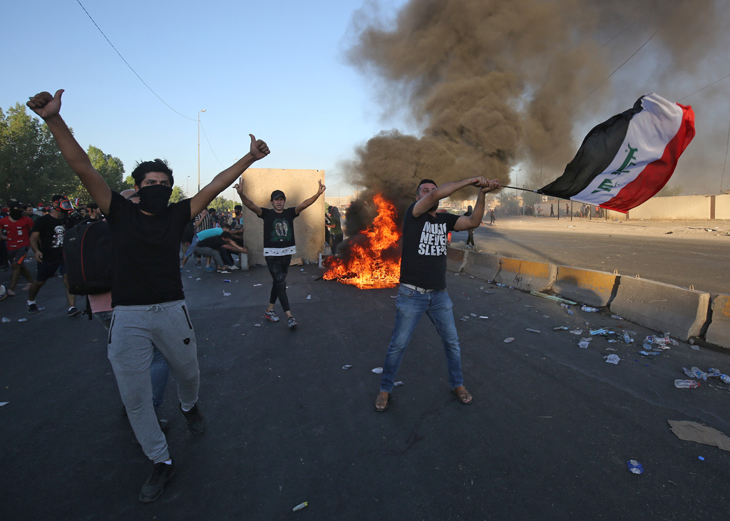 Irakische Demonstranten in der Hauptstadt Bagdad (Bild: Ahmad Al-Rubaye/AFP)