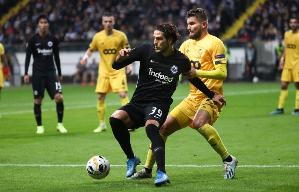 Eintracht's Goncalo Paciencia and Standard's Nicolas Gavory fight for the ball during a soccer game between German club Eintracht Frankfurt e.V. and Belgian team Standard de Liege, Thursday 24 October 2019 in Frankfurt, Germany, on the third day of the group stage of the UEFA Europa League, in group F. BELGA PHOTO VIRGINIE LEFOUR