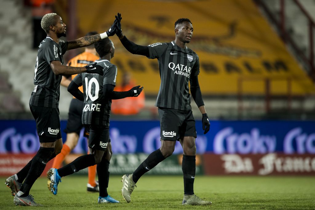 Eupen's Jonathan Bolingi and Eupen's Sulayman Marreh celebrate after scoring during a soccer game between Jupiler Pro League clubs KV Kortrijk and KAS Eupen, Wednesday 04 December 2019 in Kortrijk, in the 1/8th final of the 'Croky Cup' Belgian cup. BELGA PHOTO JASPER JACOBS