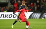 Arsenal's Emile Smith Rowe and Standard's Paul-Jose Mpoku Ebunge fight for the ball during a soccer match of Belgian team Standard de Liege against English club Arsenal F.C., Thursday 12 December 2019 in Liege, on the sixth and last day of the group stage of the UEFA Europa League, in group F. BELGA PHOTO VIRGINIE LEFOUR
