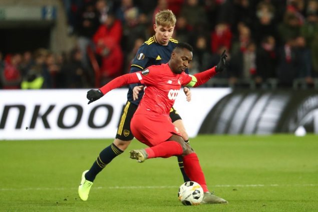 Arsenal's Emile Smith Rowe and Standard's Paul-Jose Mpoku Ebunge fight for the ball during a soccer match of Belgian team Standard de Liege against English club Arsenal F.C., Thursday 12 December 2019 in Liege, on the sixth and last day of the group stage of the UEFA Europa League, in group F. BELGA PHOTO VIRGINIE LEFOUR