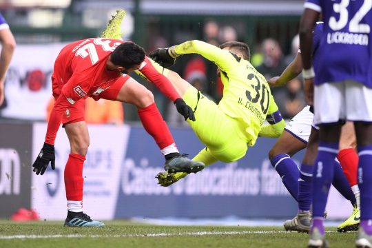 tandard's Konstantinos Kostas Laifis and Anderlecht's goalkeeper Hendrick Van Crombrugge pictured in action during a soccer match between Standard de Liege and RSC Anderlecht, Sunday 15 December 2019 in Liege, on day 19 of the 'Jupiler Pro League' Belgian soccer championship season 2019-2020. BELGA PHOTO YORICK JANSENS