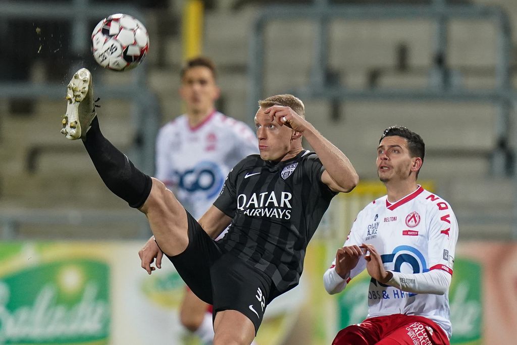 Eupen's Andreas Beck and Kortrijk's Larry Azouni fight for the ball during a soccer match between KAS Eupen and KV Kortrijk, Saturday 21 December 2019 in Eupen, on day 20 of the 'Jupiler Pro League' Belgian soccer championship season 2019-2020. BELGA PHOTO BRUNO FAHY
