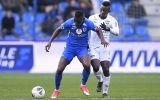 Genk's Aly Mbwana Samatta and Eupen's Lazare Armani fight for the ball during a soccer match between KRC Genk and KAS Eupen, Thursday 26 December 2019 in Genk, on day 21 of the 'Jupiler Pro League' Belgian soccer championship season 2019-2020. BELGA PHOTO YORICK JANSENS