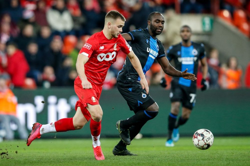 Standard's Nicolas Raskin and Club's Eder Balanta fight for the ball during a soccer match between Standard de Liege and Club Brugge, Wednesday 12 February 2020 in Liege, on day 25 of the 'Jupiler Pro League' Belgian soccer championship season 2019-2020. The match was postponed last Sunday, because of storm Ciara. BELGA PHOTO BRUNO FAHY