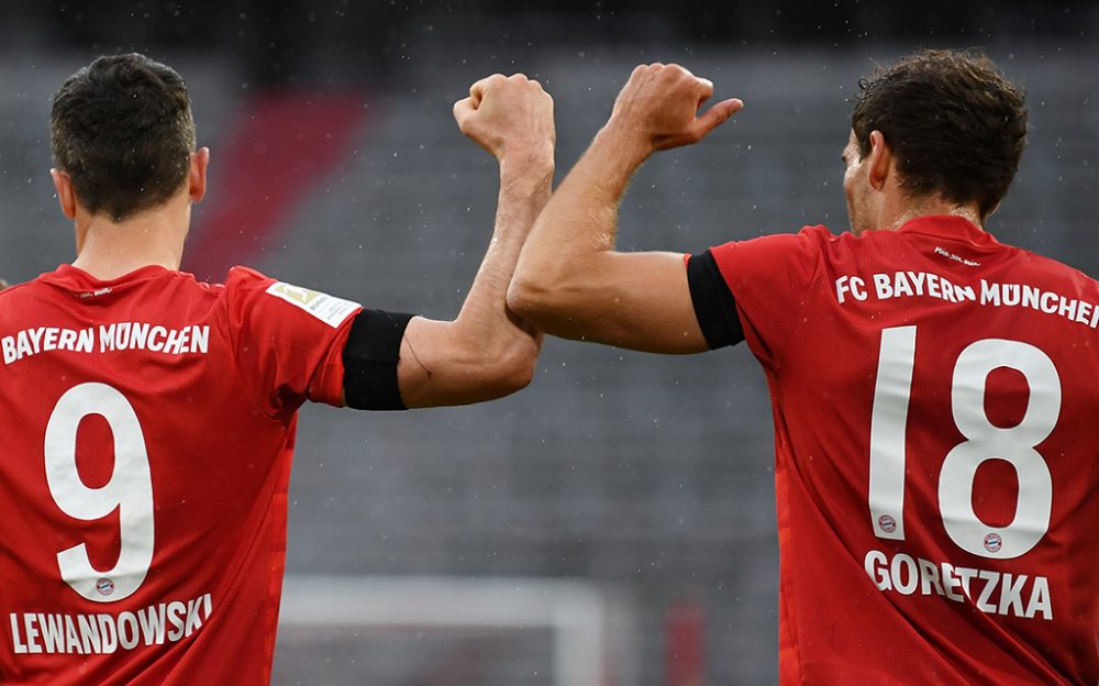 Robert Lewandowski und Leon Goretzka vom FC Bayern München beim Spiel gegen Eintracht Frankfurt am 23. Mai (Bild: Andreas Gebert/Pool/AFP)