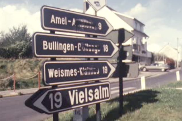 Überpinselte Ortsschilder (aus einer BRT-Sendung, Quelle: Grenzerfahrungen, Band fünf)