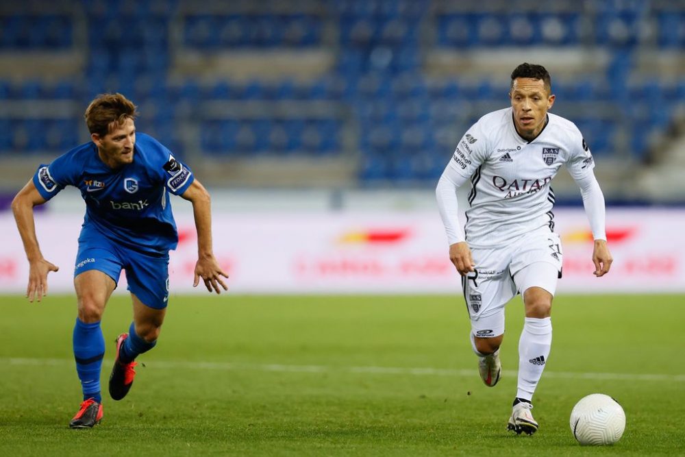 Genk's Patrik Hrosovsky and Eupen's Adriano Correia fight for the ball during the Jupiler Pro League match between KRC Genk and KAS Eupen, Friday 30 October 2020 in Genk, on day 11 of the 'Jupiler Pro League' first division of the Belgian soccer championship. BELGA PHOTO BRUNO FAHY