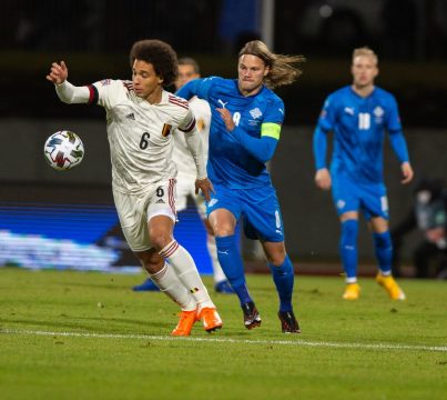 Belgium's Axel Witsel and Iceland's Birkir Bjarnason fight for the ball during the soccer match between the Belgian national soccer team Red Devils and Iceland, Wednesday 14 October 2020 in Reykjavik, Iceland, a European Cup 2020 qualification game. The Euro 2020 European Soccer Championships have been postponed to 2021, due to the ongoing coronavirus pandemic. BELGA PHOTO ARNI TORFASON
