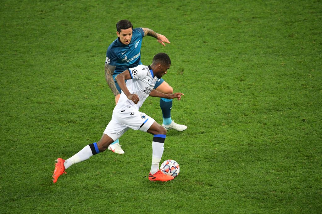 Club's Clinton Mata and Zenit's player pictured in action during the first game of the group stage of the UEFA Champions League, in the group F, between Russian Zenit Saint-Petersbourg and Belgian soccer team Club Brugge, Tuesday 20 October 2020 in Saint-Petersbourg, Russia. BELGA PHOTO ALEXEI DANICHEV