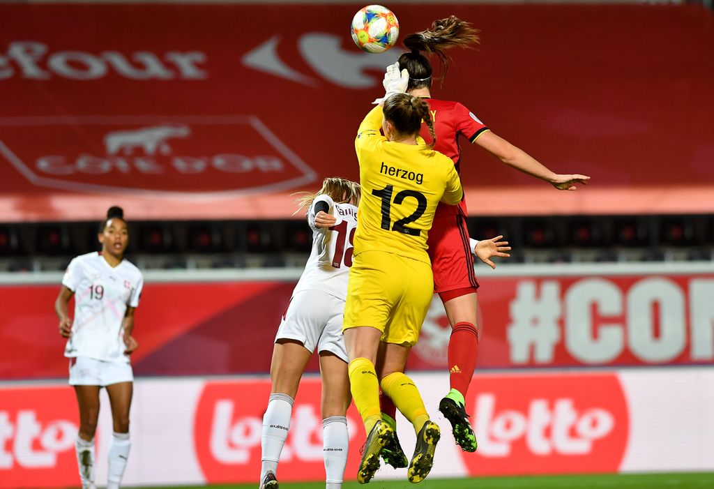 Belgium's Tine De Caigny scores a goal past Switzerland's goalkeeper Elvira Herzog during a soccer game between Belgium's Red Flames and Switzerland, Tuesday 01 December 2020 in Heverlee, the last qualification game for the women's Euro 2021 European Championships. BELGA PHOTO DAVID CATRY