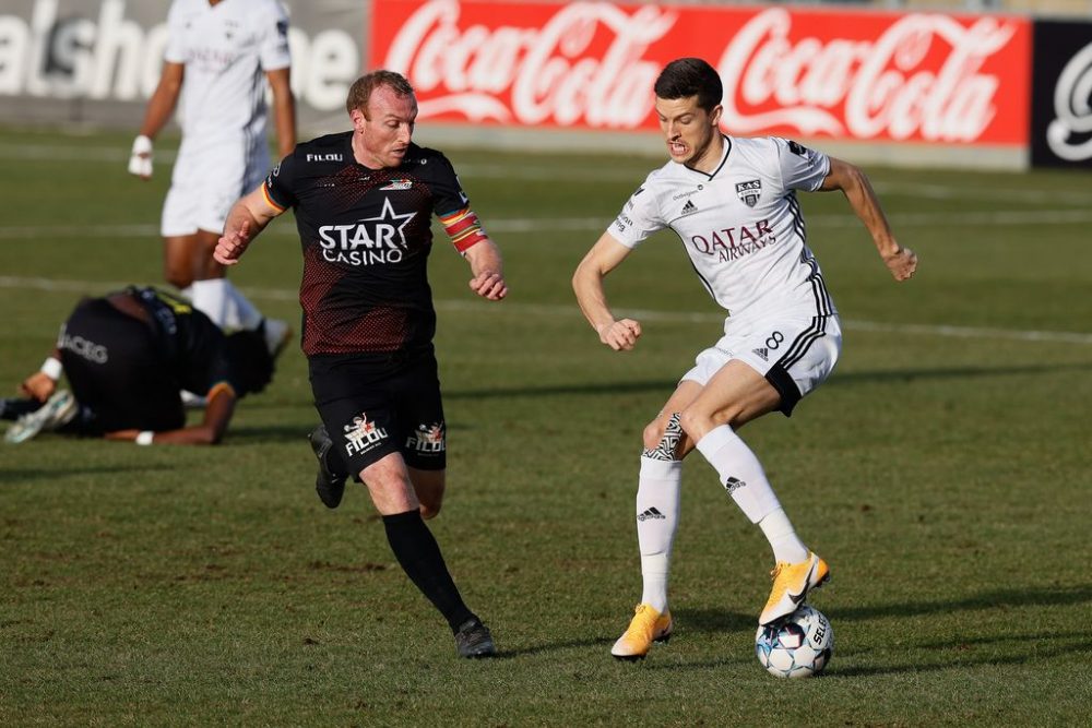 Oostende's Kevin Vandendriessche and Eupen's Stef Peeters fight for the ball during a soccer match between KAS Eupen and KV Oostende, Saturday 20 February 2021 in Eupen, on day 27 of the 'Jupiler Pro League' first division of the Belgian championship. BELGA PHOTO BRUNO FAHY