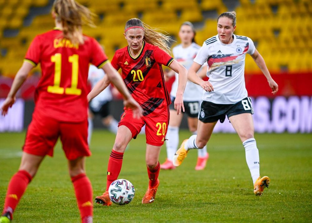 Belgium's Julie Biesmans and Germany's Sydney Lohmann pictured in action during a friendly soccer game between Belgium's national team the Red Flames and Germany, Sunday 21 February 2021 in Aachen, Germany. BELGA PHOTO DAVID CATRY