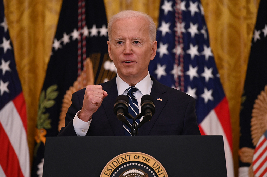 Joe Biden bei einer Pressekonferenz am 25. März (Bild: Jim Watson/AFP)