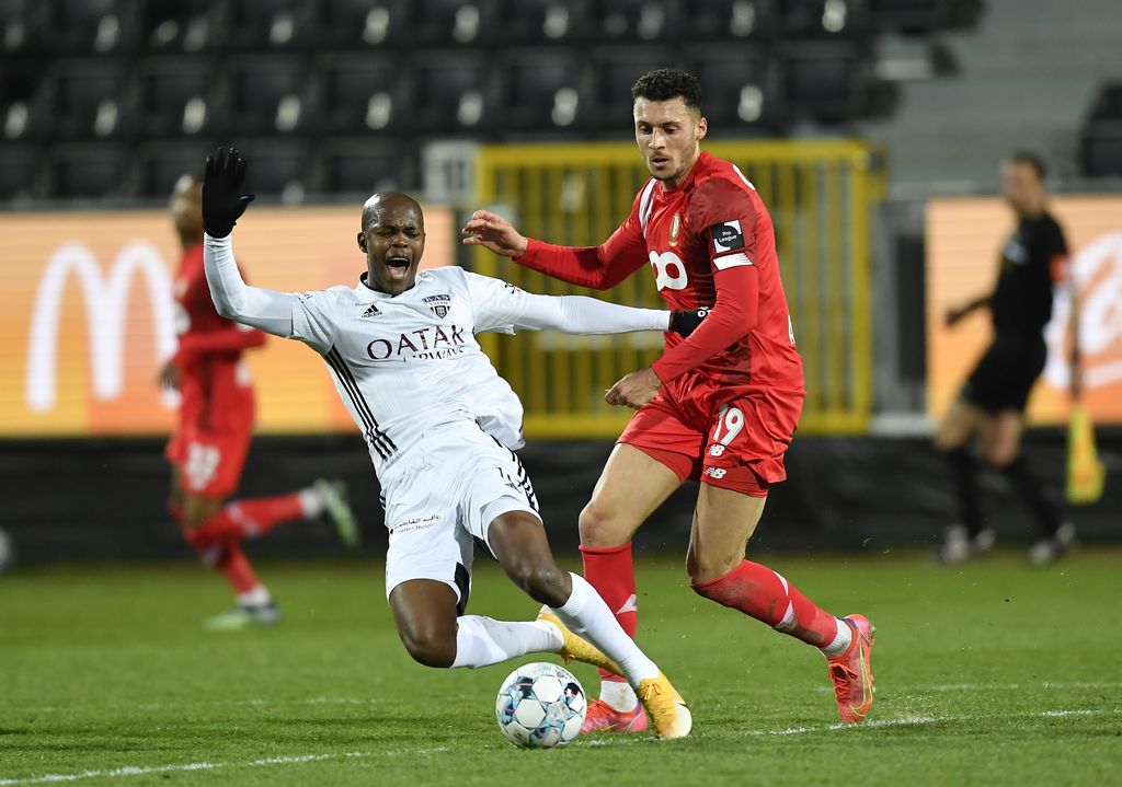 Standard's Selim Amallah and Eupen's Julien Fontaine Ngoy Bin Cibambi fight for the ball during a soccer match between KAS Eupen and Standard de Liege, Friday 09 April 2021 in Eupen, on day 33 of the 'Jupiler Pro League' first division of the Belgian championship. BELGA PHOTO JOHN THYS