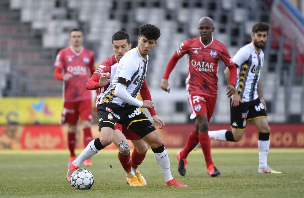 Charleroi's Amine Benchaib and Eupen's Stef Peeters fight for the ball during a soccer match between Sporting Charleroi and KAS Eupen, Saturday 17 April 2021 in Charleroi, on the 34th and last day of the regular season of the 'Jupiler Pro League' first division of the Belgian championship. BELGA PHOTO JOHN THYS