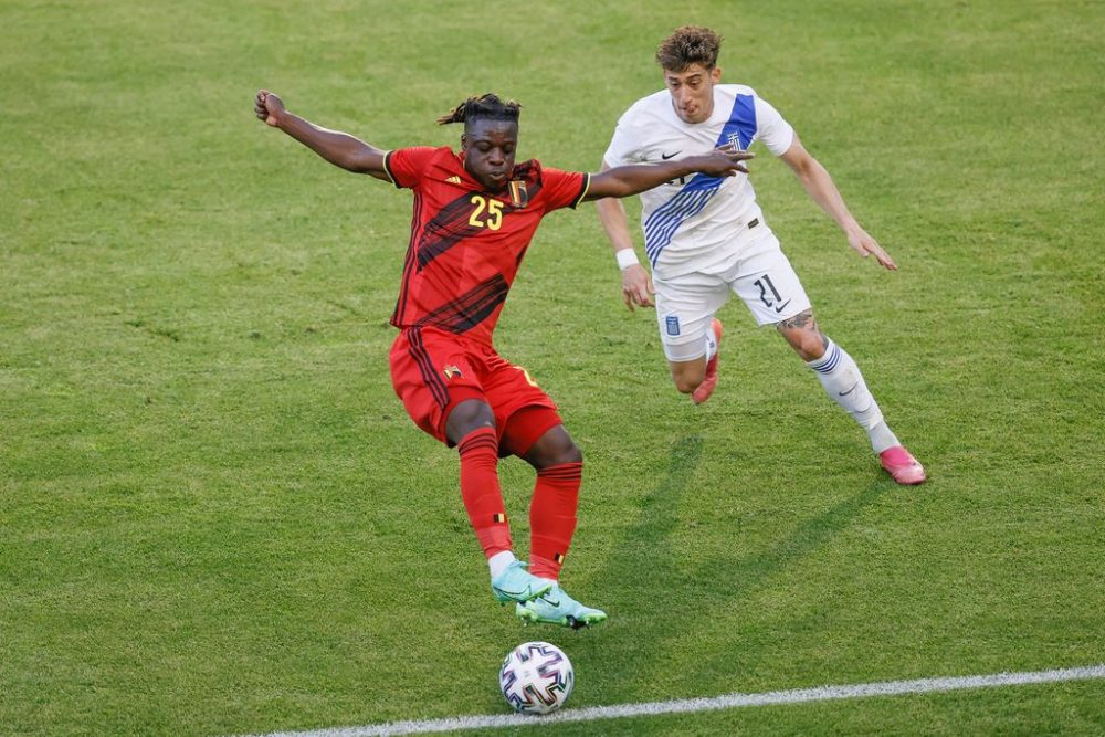 Belgium's Jeremy Doku and Greece Kostas Tsimikas fight for the ball during a friendly game of the Belgian national soccer team Red Devils and Greece national team, in Brussels, part of the preparation for the Euro2020 tournament Thursday 03 June 2021. BELGA PHOTO BRUNO FAHY