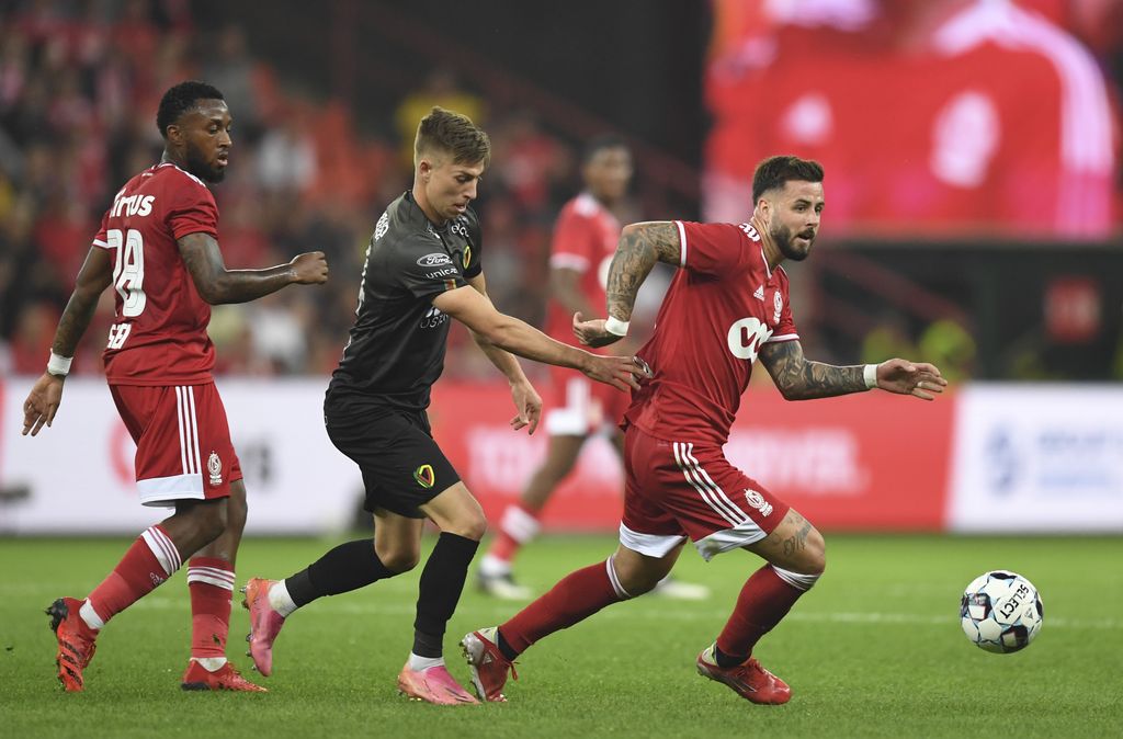 Oostende's Nick Batzner and Standard's Aron Donnum fight for the ball during a soccer match between Standard de Liege and KV Oostende, Friday 20 August 2021 in Liege, on day 5 of the 2021-2022 'Jupiler Pro League' first division of the Belgian championship. BELGA PHOTO JOHN THYS
