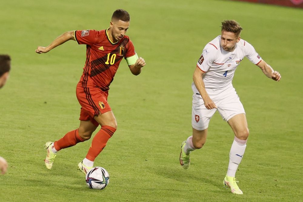 Belgium's Eden Hazard and Czech Filip Kasa fight for the ball during a soccer game between Belgian national team Red Devils and Czech Republic, Sunday 05 September 2021 in Brussels, game 5 in group E of the qualifications for the 2022 FIFA World Cup. BELGA PHOTO BRUNO FAHY