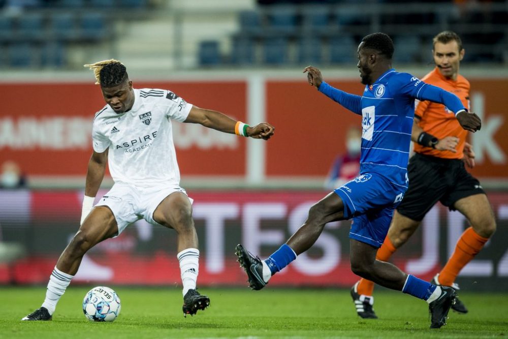 Eupen's Emmanuel Agbadou and Gent's Elisha Owusu fight for the ball during a soccer match between KAA Gent and KAS Eupen, Sunday 17 October 2021 in Gent, on day 11 of the 'Jupiler Pro League' first division of the Belgian championship. BELGA PHOTO JASPER JACOBS