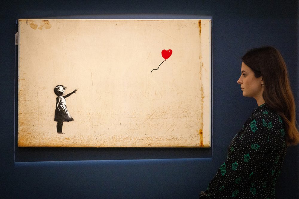 Banksy-Gemälde "Girl with Balloon" (Bild: Tolga Akmen/AFP)