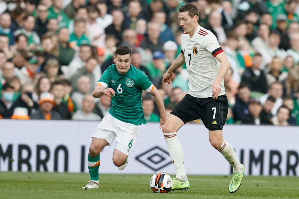 Irish Josh Cullen and Belgium's Hans Vanaken fight for the ball during a friendly soccer match between Ireland and the Belgian national team, the Red Devils, Saturday 26 March 2022 in Dublin. BELGA PHOTO BRUNO FAHY