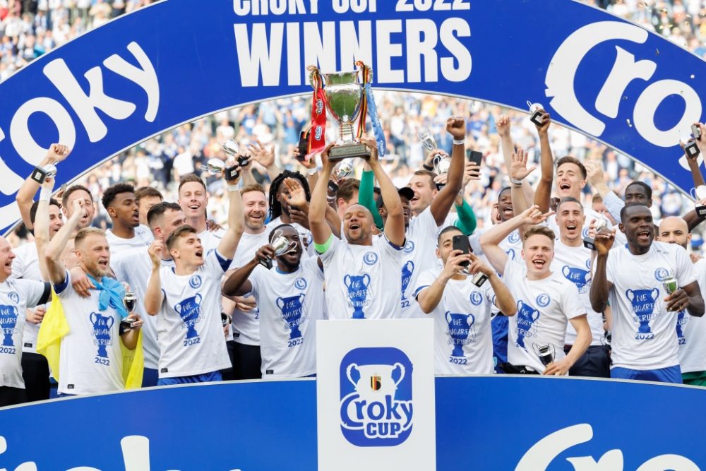 Gent's players celebrates on the podium after winning the Belgian Cup final (Croky Cup) match between Belgian first league soccer teams KAA Gent and RSC Anderlecht, Monday 18 April 2022 at the King Baudouin stadium in Brussels. BELGA PHOTO KURT DESPLENTER